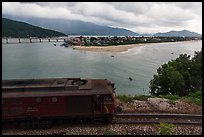 Train, bay, and village. Vietnam (color)