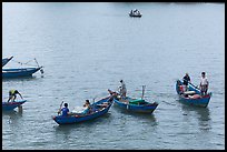 Fishermen on small boats. Vietnam (color)