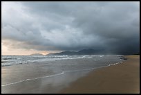 Stormy sunrise on beach. Vietnam ( color)