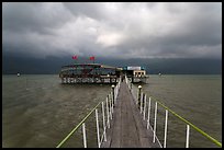 Pier leading to restaurant on stilts. Vietnam ( color)