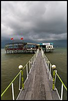 Boarwal, offshore restaurant, and threatening clouds. Vietnam ( color)