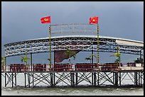 Communist flags flying on restaurant. Vietnam ( color)
