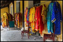Coat hangers with silk robes in imperial style, citadel. Hue, Vietnam ( color)