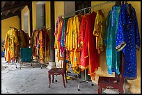 Coat hangers with silk robes in imperial style, citadel. Hue, Vietnam (color)