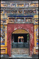 Palace and silhouettes seen from doorway, citadel. Hue, Vietnam ( color)