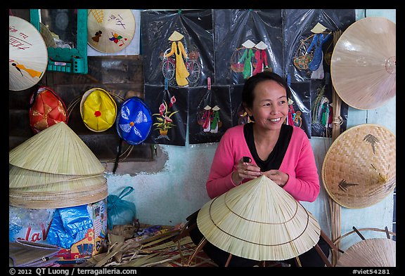 Woman in hat-making workshop. Hue, Vietnam (color)