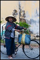 Elderly woman with bicycle, Thanh Toan. Hue, Vietnam (color)