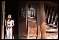 Woman in doorway, Temple of the Litterature. Hanoi, Vietnam (color)