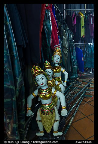 Water puppets controlled using long bamboo rods and string mechanism. Hanoi, Vietnam