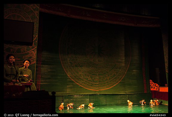 Musicians and water puppets during performance, Thang Long Theatre. Hanoi, Vietnam (color)