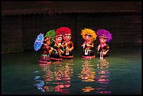 Water puppets (5 characters with umbrellas), Thang Long Theatre. Hanoi, Vietnam ( color)