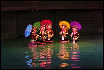 Water puppets (5 characters with umbrellas), Thang Long Theatre. Hanoi, Vietnam (color)