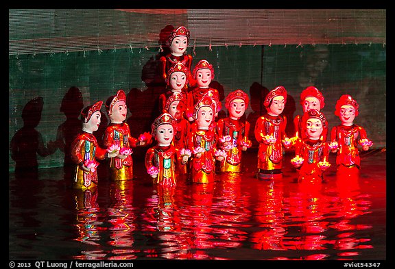 Water puppets (14 characters with lotus), Thang Long Theatre. Hanoi, Vietnam (color)