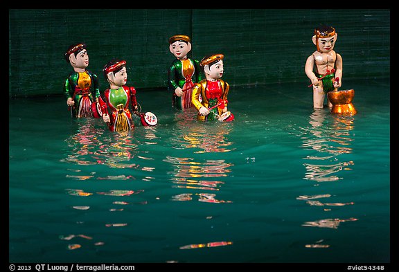 Water puppets (5 characters with musical instruments), Thang Long Theatre. Hanoi, Vietnam (color)