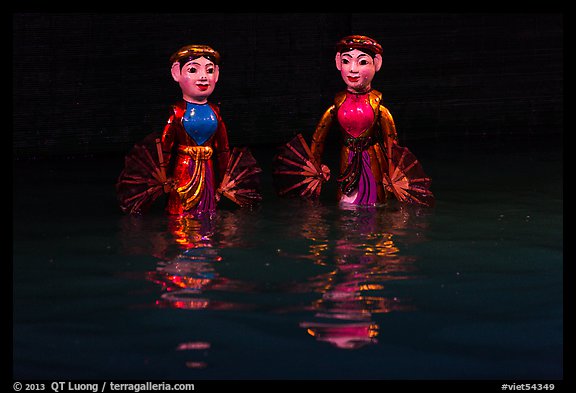 Water puppets (2 characters with fans), Thang Long Theatre. Hanoi, Vietnam