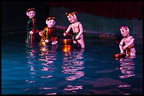 Water puppets (4 characters with musical instruments), Thang Long Theatre. Hanoi, Vietnam (color)