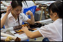 Women in silk embroidery factory. Vietnam ( color)