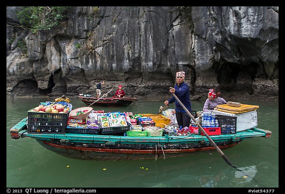 Grocer on rowboat. Halong Bay, Vietnam