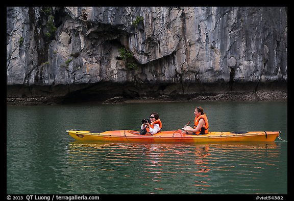 Paddlers. Halong Bay, Vietnam