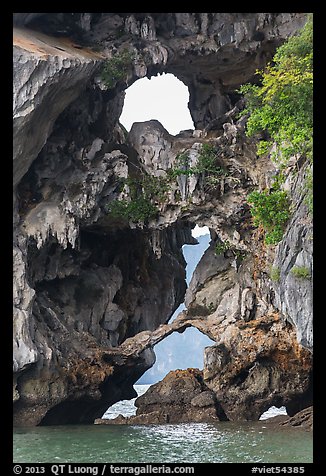 Openings through rocks. Halong Bay, Vietnam (color)