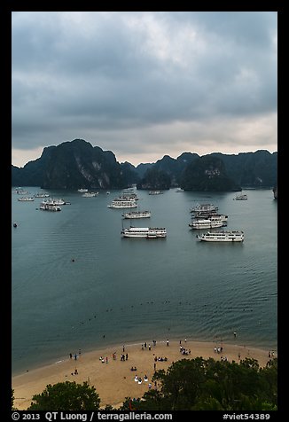 Elevated view of beach, boats and karst from Titov Island. Halong Bay, Vietnam (color)