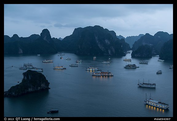 Moored boats and islands from above at dusk. Halong Bay, Vietnam (color)