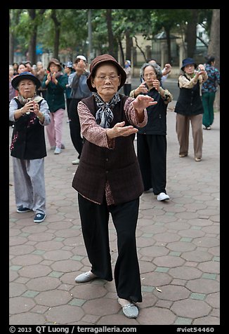 Elderly women practising Tai Chi. Hanoi, Vietnam (color)