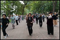 Group of women practising Tai Chi on Hoang Kiem lakeshore. Hanoi, Vietnam ( color)