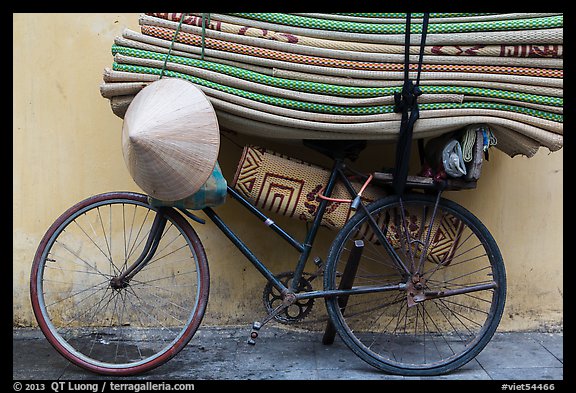 Bicycle loaded with mats, old quarter. Hanoi, Vietnam (color)