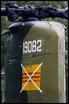 Helicopter tail with crossed-out flag of South Vietnam, Hanoi Citadel. Hanoi, Vietnam (color)