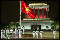 Lowering of flag in front of Ho Chi Minh Mausoleum at night. Hanoi, Vietnam (color)