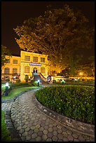 Public garden and library building at night. Hanoi, Vietnam (color)