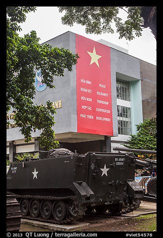 Tanks and signs extolling peace, War Remnants Museum, district 3. Ho Chi Minh City, Vietnam