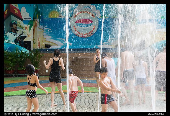Group playing in water, Dam Sen Water Park, district 11. Ho Chi Minh City, Vietnam (color)