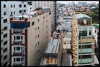 Rooftop view of skinny hotel buildings. Ho Chi Minh City, Vietnam (color)