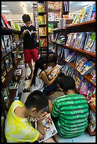 Children reading in bookstore. Ho Chi Minh City, Vietnam (color)