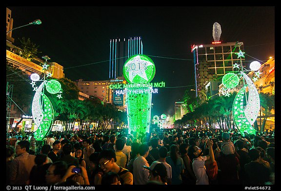 Crowds on Nguyen Hue boulevard on New Year eve. Ho Chi Minh City, Vietnam (color)