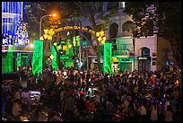 Crowds on street at night, New Year eve. Ho Chi Minh City, Vietnam (color)