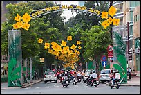 Street with holiday decorations. Ho Chi Minh City, Vietnam ( color)