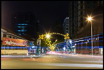 Dong Khoi street at night with light trails and decorations. Ho Chi Minh City, Vietnam (color)
