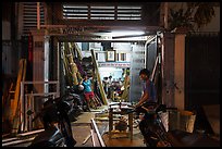 Frame shop at night. Ho Chi Minh City, Vietnam ( color)