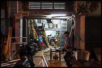 Frame shop at night. Ho Chi Minh City, Vietnam (color)