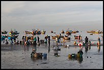 Fishermen, vendors, and boats. Mui Ne, Vietnam (color)