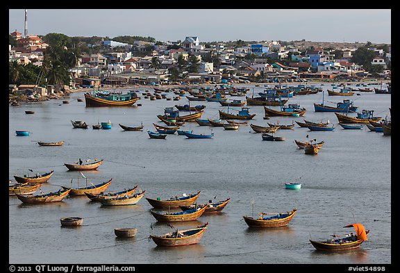Fishing boats and village. Mui Ne, Vietnam (color)