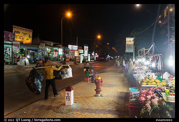 Stalls on main street at night. Mui Ne, Vietnam (color)
