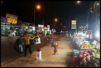 Stalls on main street at night. Mui Ne, Vietnam (color)