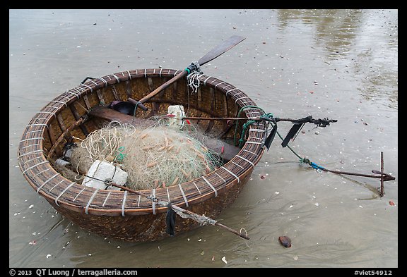 Round coracle boat with fishing gear. Mui Ne, Vietnam (color)