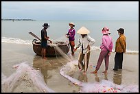 Fishermen, net, and coracle boat. Mui Ne, Vietnam ( color)