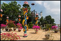 Sculptures of Chinese dragons at Temple of the Coconut Monk. My Tho, Vietnam (color)