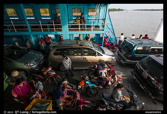 Abord ferry across the Mekong River. Mekong Delta, Vietnam (color)